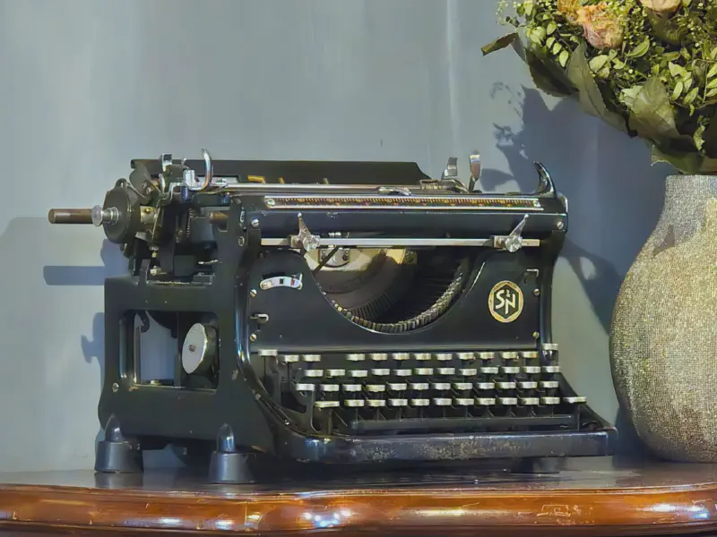 Old typewriter on a dresser