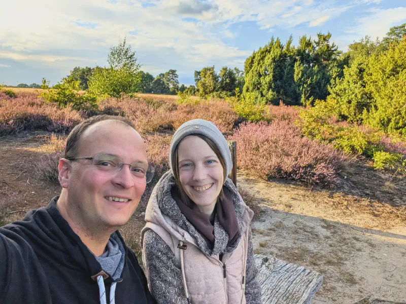 Oli and Gina taking a selfie in the heather